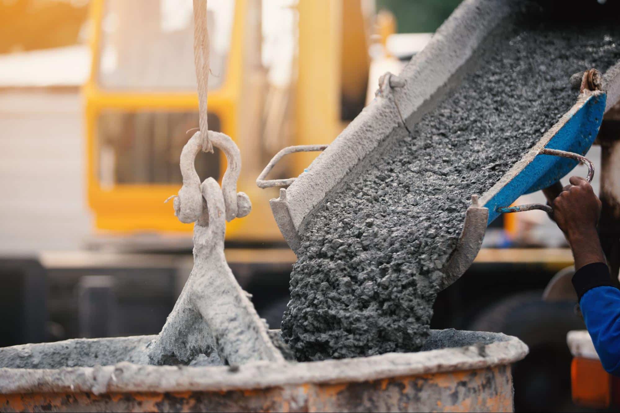 cement being poured into large bucket